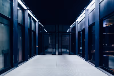 Dark commercial hallway with a modern design